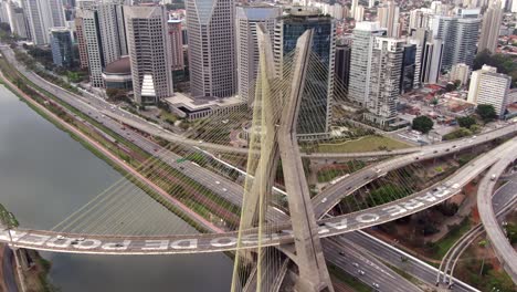 aerial view of traffic on the iconic octavio frias de oliveira bridge aka ponte estaiada in sao paulo, the business and financial centre of brazil and largest city in south america