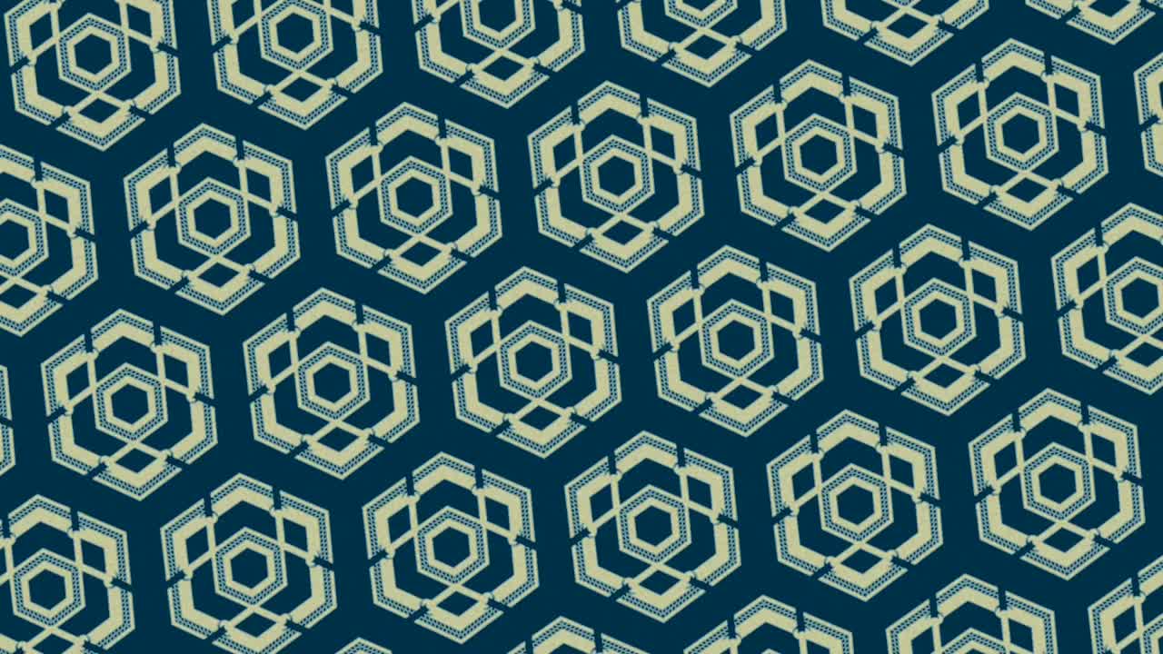 Geometric cube pattern on blue background, spinning graphic