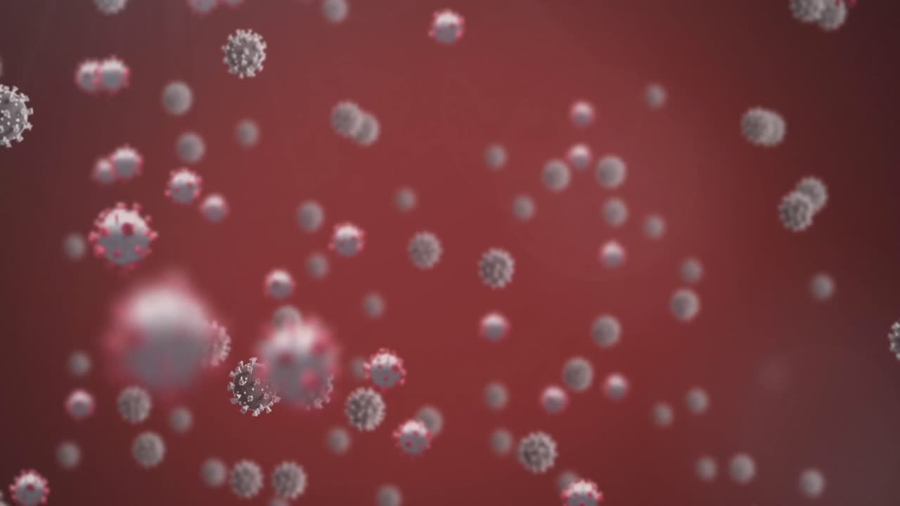 Animazione di macro cellule di Covid-19 che fluttuano su sfondo rosso