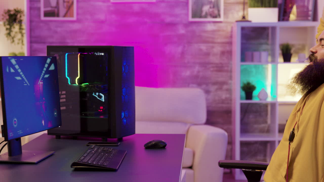 Man playing video games at his computer