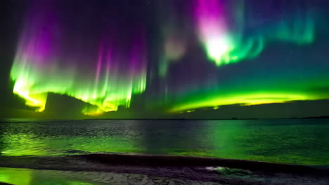 aurora borealis over a lake at night