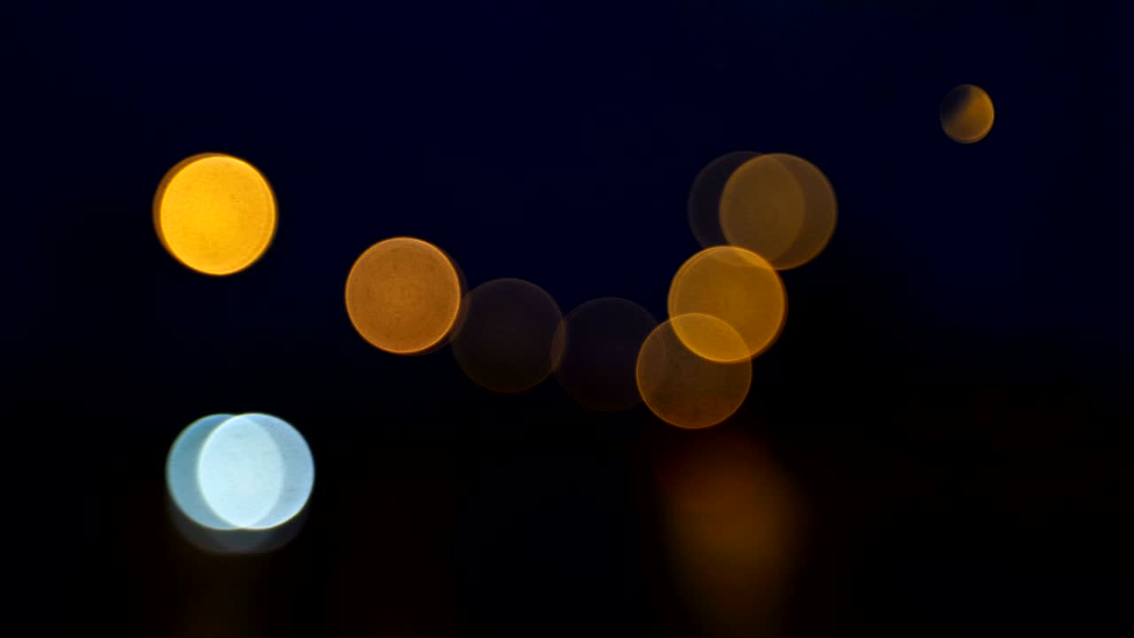 Defocus lights of the cars of the night city 4K Slow Mo