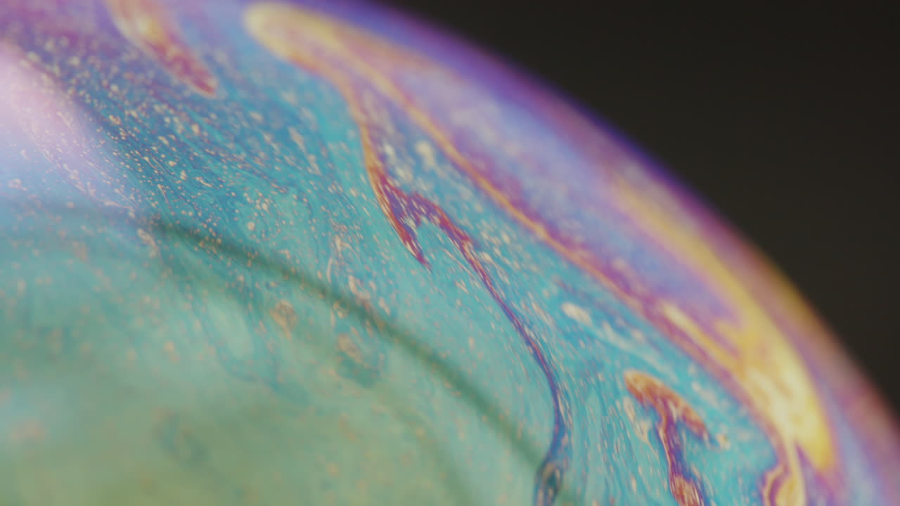 foto macro de una esfera fluorescente, con muchas partículas en la superficie