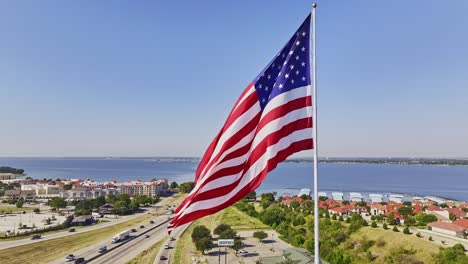 Large-American-Flag-close-up-in-Rockwall,-Tx