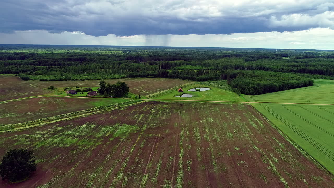 k drone flight over farmland after harvest with