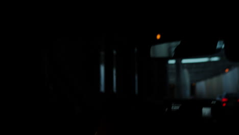 driver inside car approaching tunnel