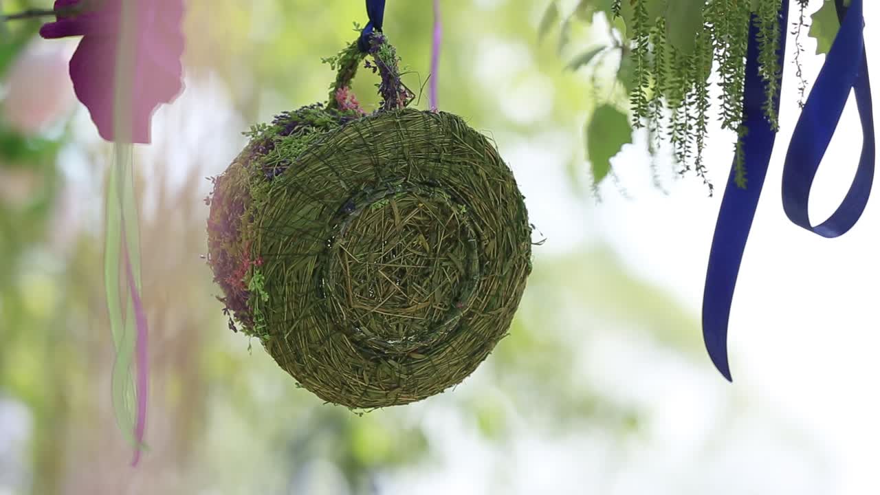 Wedding decor, decor in the trees, flowers in cages