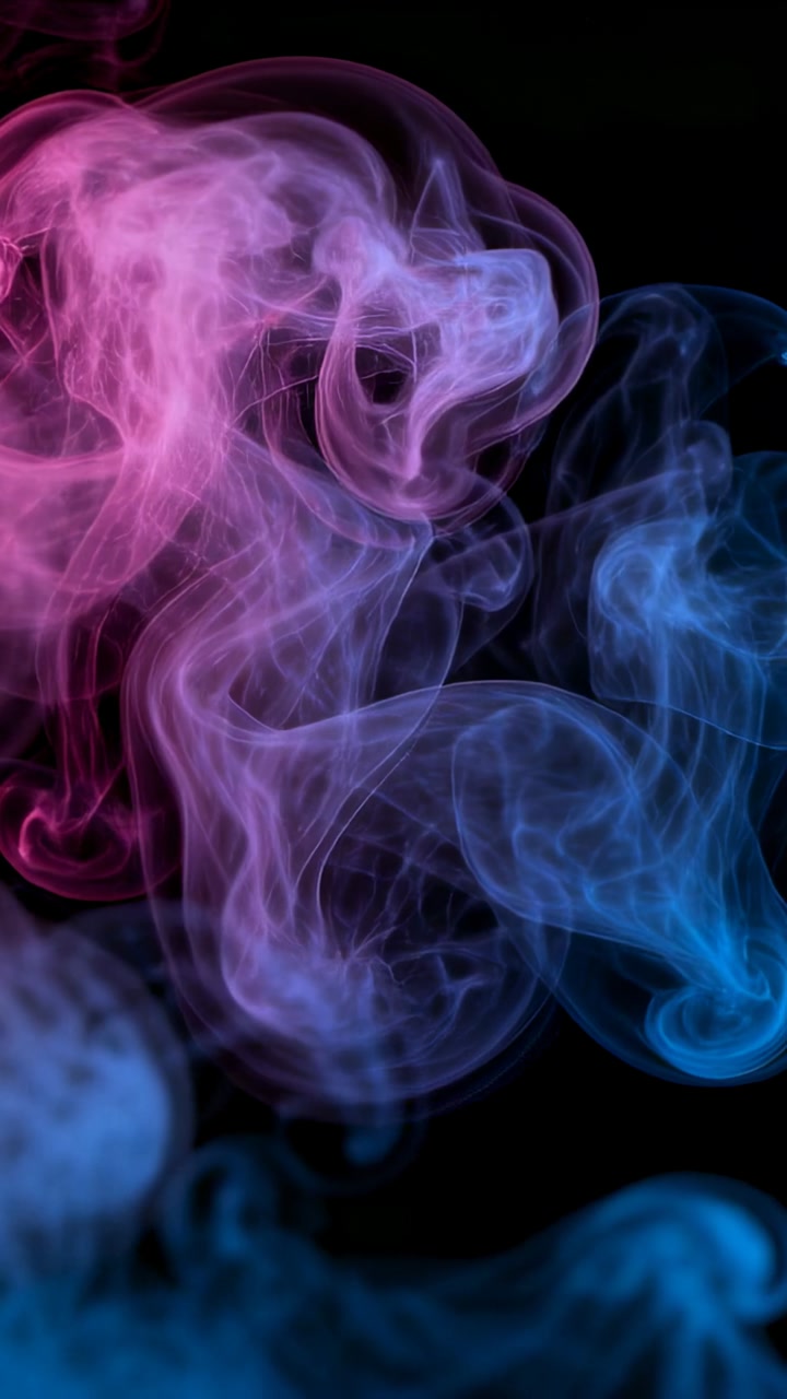 Vertical video: Curling pink and blue smoke plumes moving on black backdrop, source for LED test