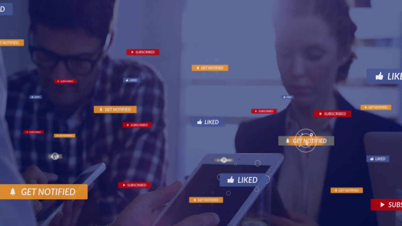 Animation of media icons over diverse business people using tablet