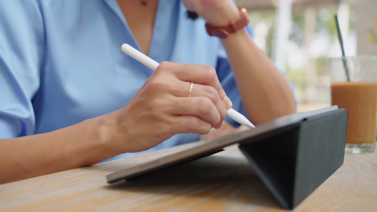 Female Designer Doing Sketch on Tablet Computer