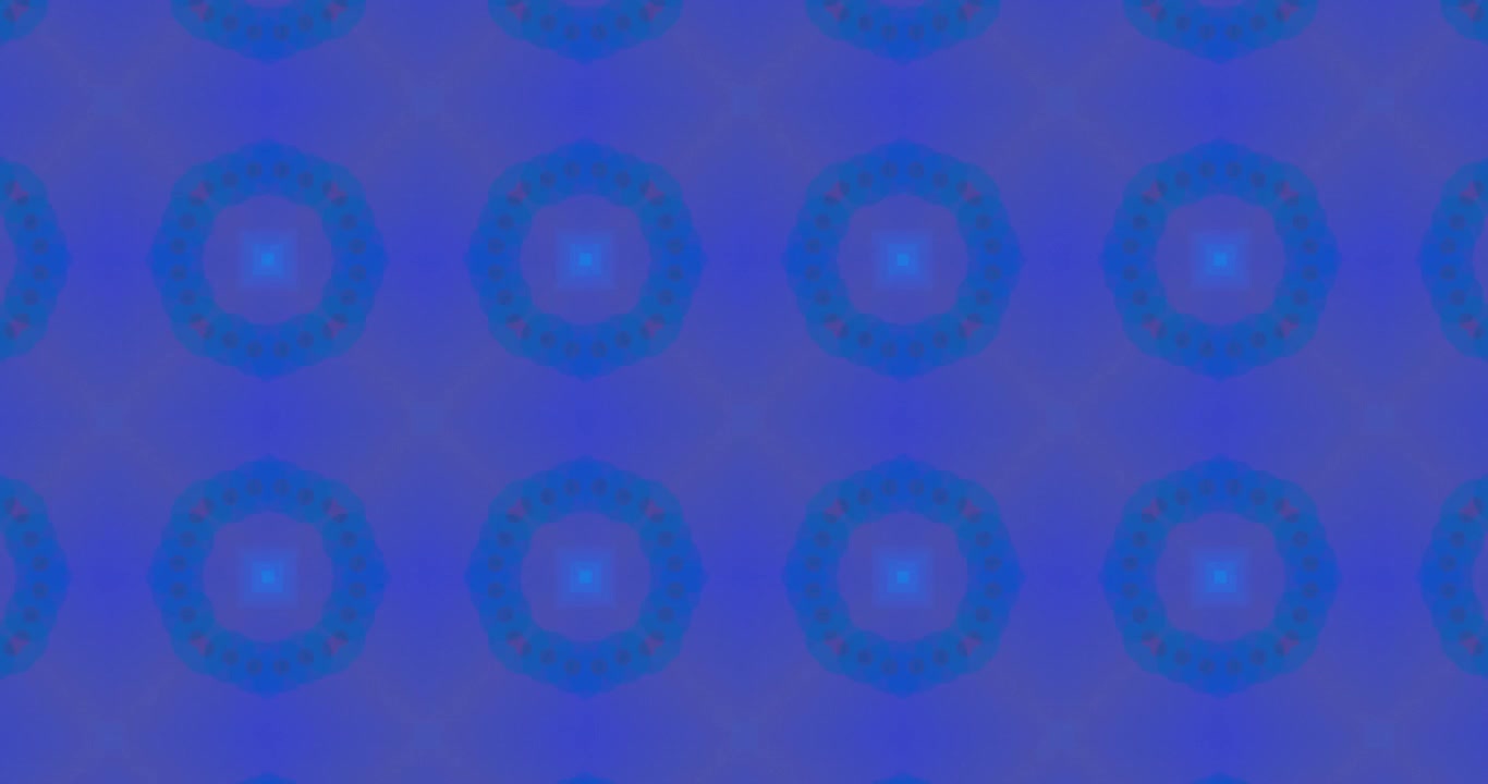 Kaleidoscopic shapes moving hypnotically on purple background