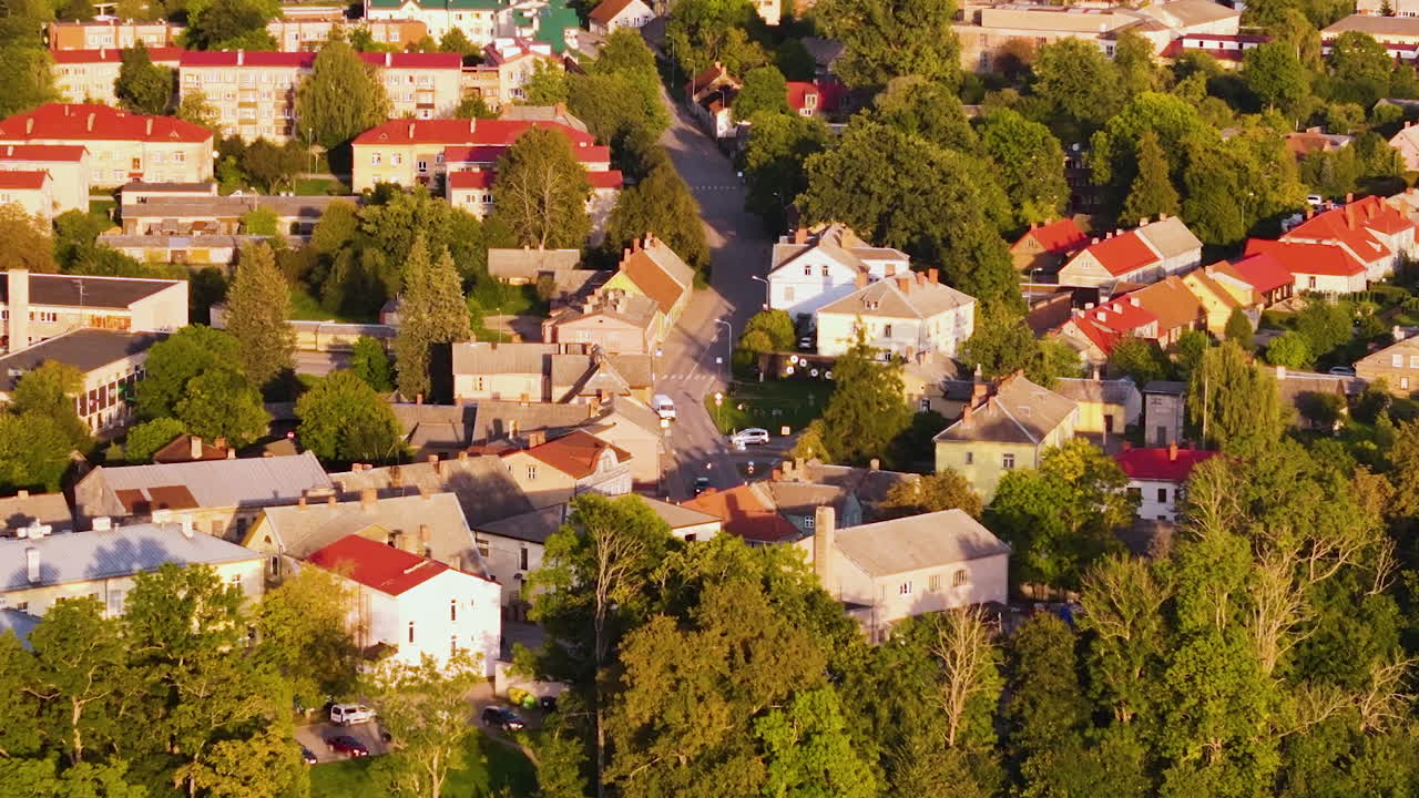 Aizpute Hotels, Attractions, And Restaurants; Aerial Zoom In Over A Historic Town In The Courland Region Of Latvia, Europe.