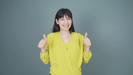 Woman-clapping-excitedly-to-camera.