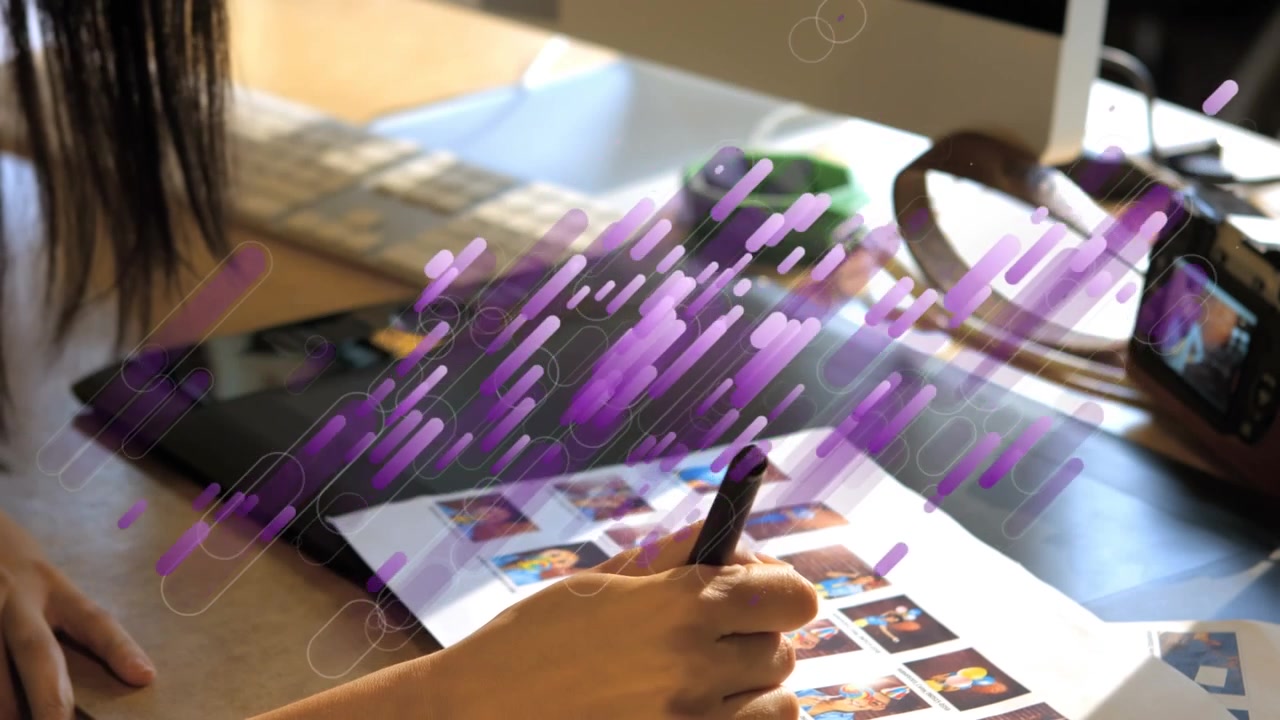 Creative Woman Drawing on Graphics Tablet in a Modern Office