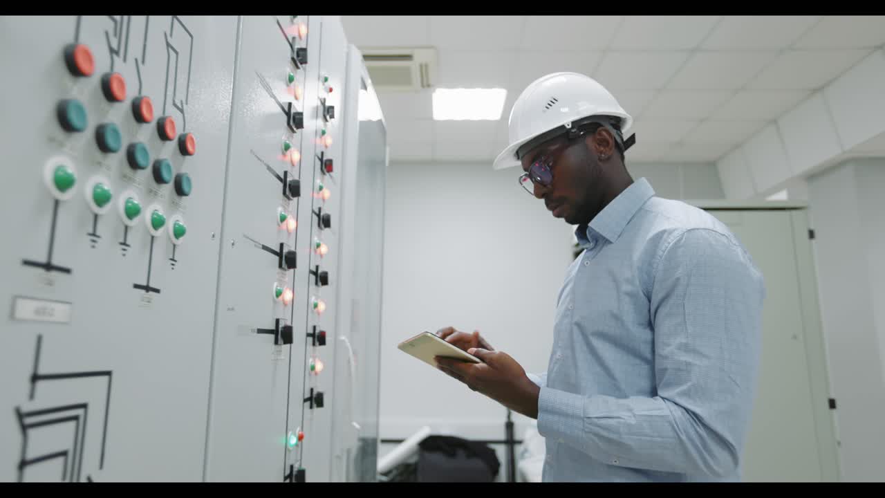 Engineer working on a control panel