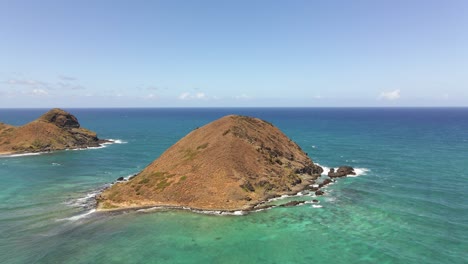 wide angle aerial view of the front side of the mokulua islands in lanikai hawaii