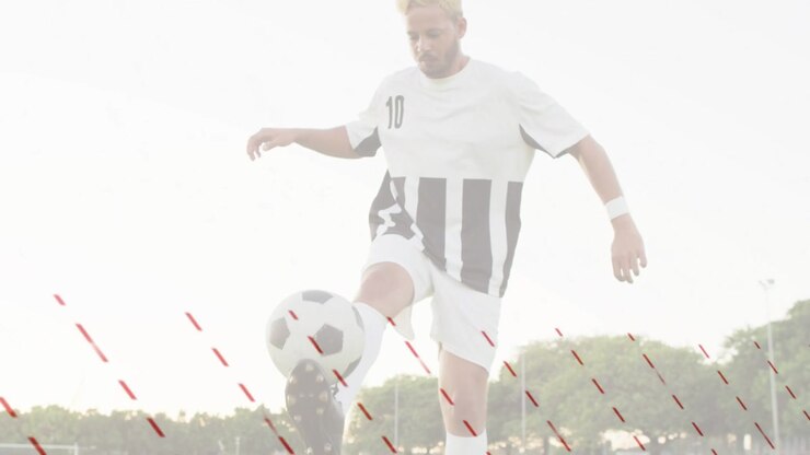 Calciatore che tocca e palleggia il pallone, praticando il controllo, con la telecamera che rivela la maglia numero 10.