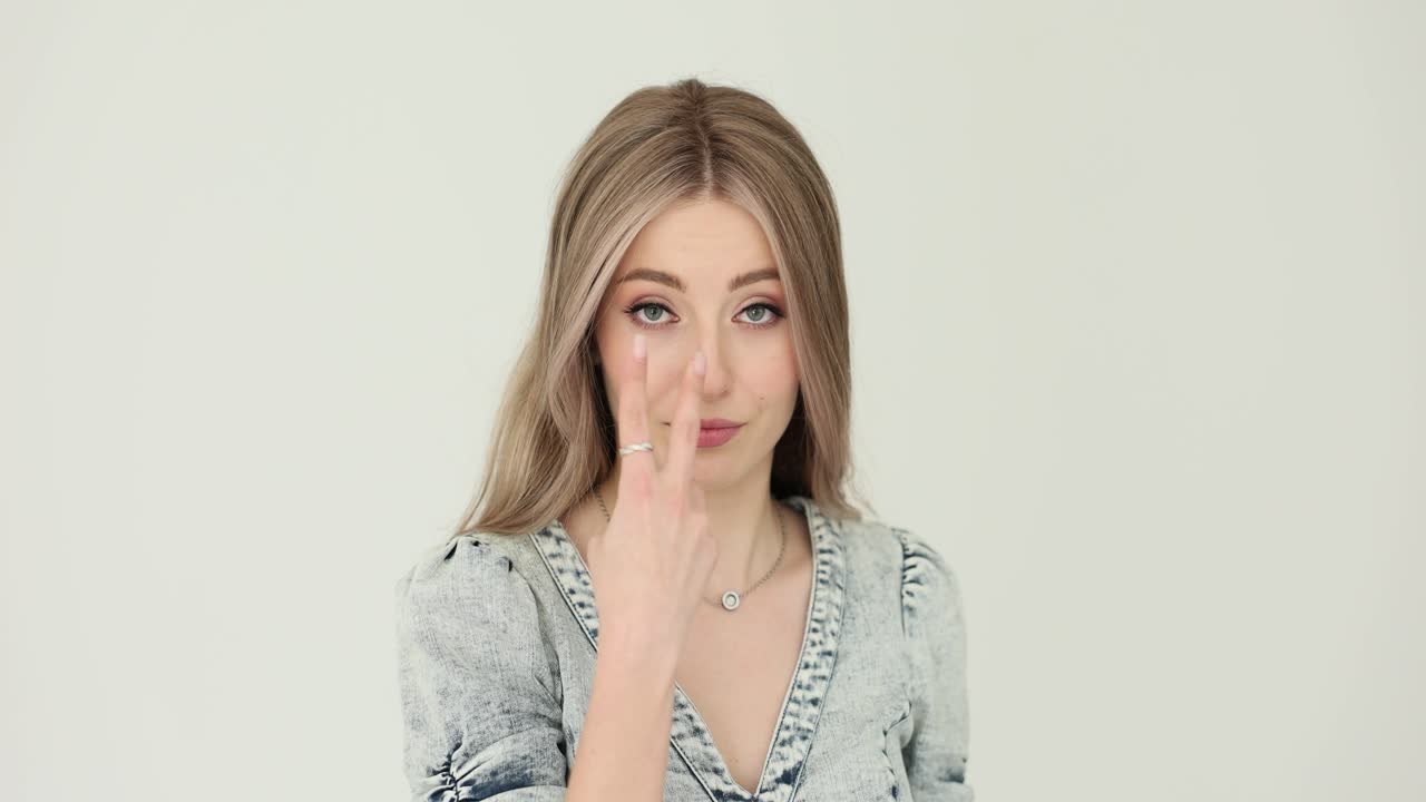 Portrait of a Woman with Hand Gestures