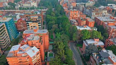 aerial flyover establishing in the el virrey park in the el chicó neighborhood of bogota, colombia with air contamination