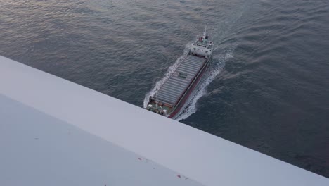 Cargo-Container-Ship-going-under-Kurushima-Kaikyo-Bridge-in-Shikoku-Japan