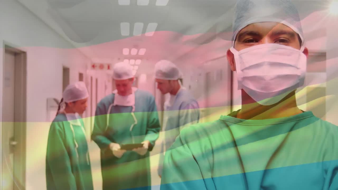 Animation of flag of germany waving over surgeons in operating theatre