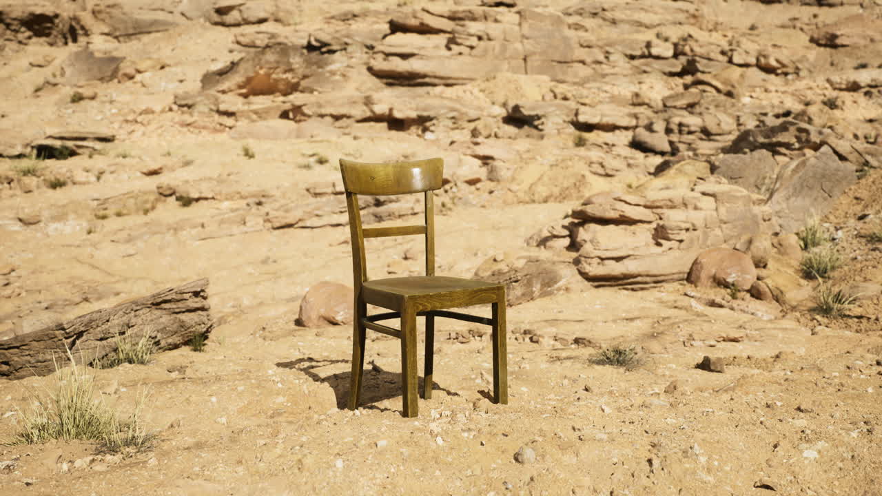 Lonely chair in a barren desert landscape under bright sunlight