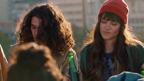 group-of-diverse-friends-hanging-out-dancing-together-mixed-race-woman-enjoying-rooftop-party-dance-music-at-sunset-drinking-alcohol-having-fun-on-weekend-gathering