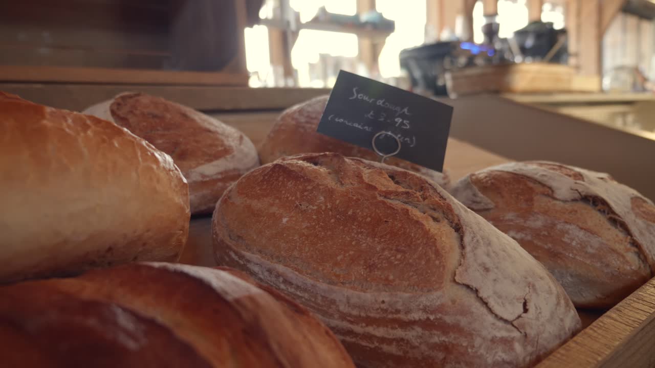 Medium close up of Sour dough loaves in farm shop during daytime