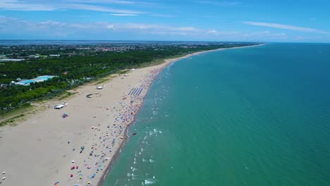 italy, the beach of the adriatic sea. rest on the sea near venice. aerial fpv drone flights.