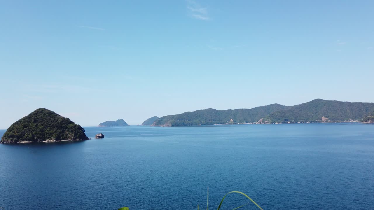 Panning landscape of Japanese Ocean Sea with Tropical Mountain Island Vibes, Summer at Fukui Japan, Diamond Beach