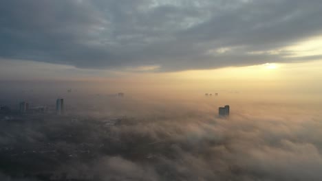 misty sunrise over cityscape