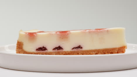 a slice of strawberry cheesecake