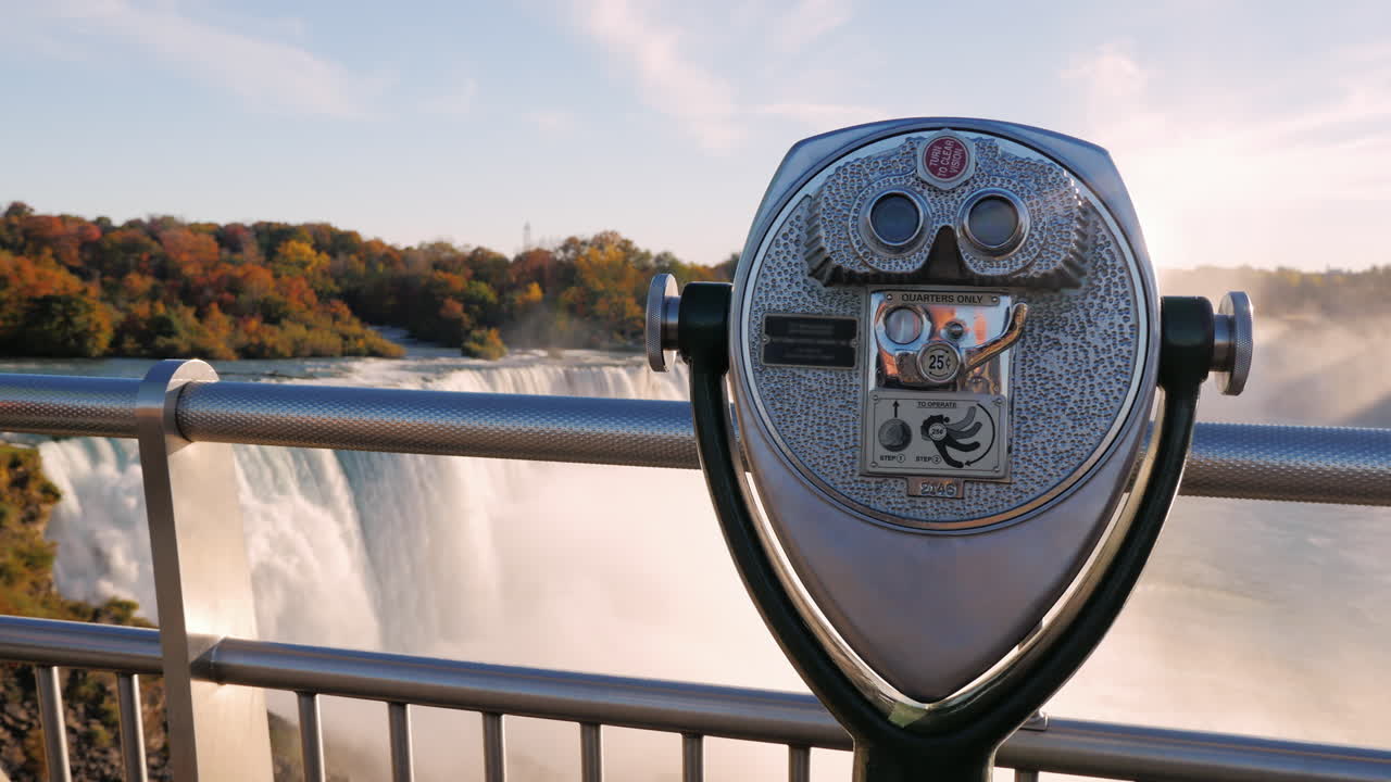A Coin Operated Binocular Viewer Located In Niagara Falls With A View To The Falls Out Of Focus In The Background 1
