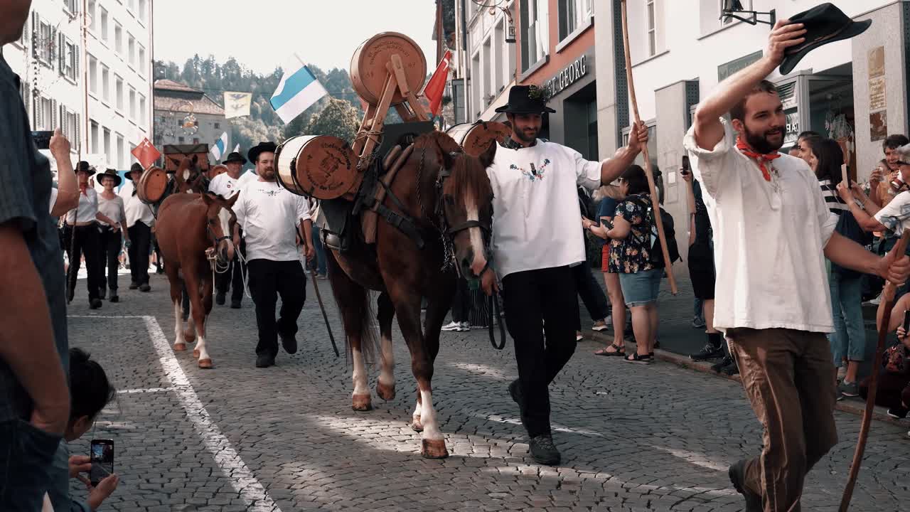You can see the traditional alpine descent of the cows with the farmers. This is an annual custom in Switzerland. Taken in Einsiedeln.