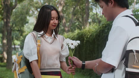 girl receiving flower bouquet