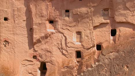 Ancient-Christian-tombs-and-carvings-on-a-cliff-face-in-Cappadocia-Turkey