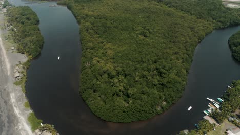 Aerial-View-Of-El-Paredon-On-The-Bank-Of-Rio-Acome-With-Mangrove-Forest-In-Guatemala