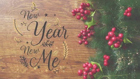 animation of new year new me text over christmas wreath