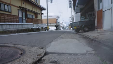 geothermal steam escaping from street of shibu onsen, nagano japan