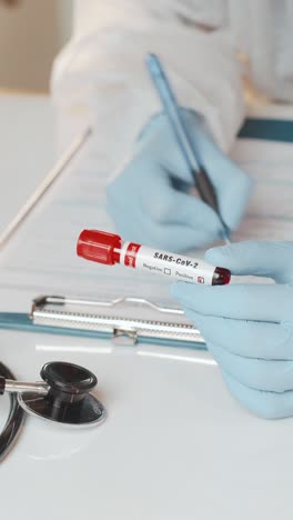 medical professional conducts a sarscov2 blood test in a clinical setting