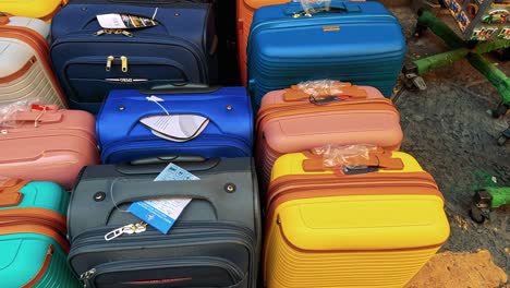 vibrant luggage stacked on a street in sorrento