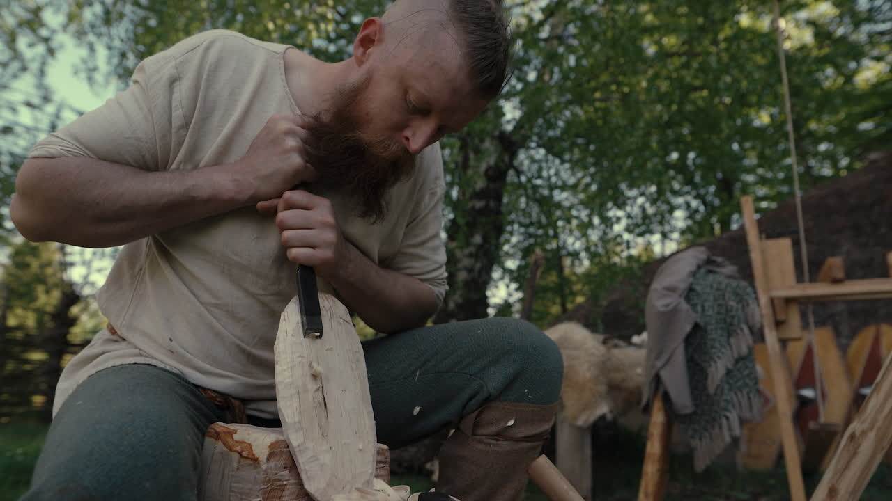 Viking Craftsman Carving Wood
