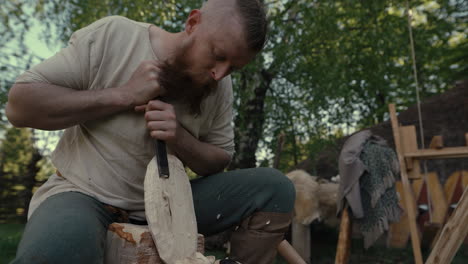 viking craftsman carving wood