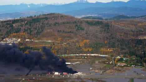 fire incident and flooding in abbotsford city in bc, canada during autumn season