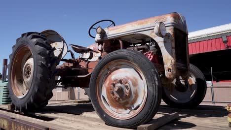 a vintage tractor from historical americana in a rural setting