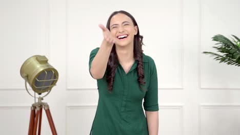 Indian-girl-laughing-on-someone