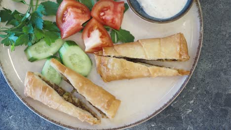 turkish pastry with vegetables and yogurt sauce