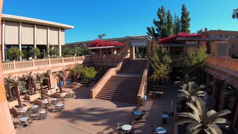 the hayden library courtyard at arizona state university campus in tempe, arizona is deserted as the university works through the covid 19 quarantine