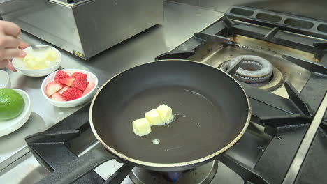 cooking with butter and strawberries