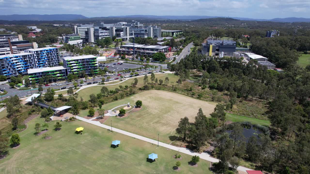 Village Heart City Park With Gold Coast University Hospital In The Background In Southport, Queensland, Australia. Aerial Drone Shot